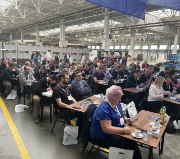 Odborný seminář společnosti KODYS zaměřený na sdílení zkušeností a moderní logistické technologie.